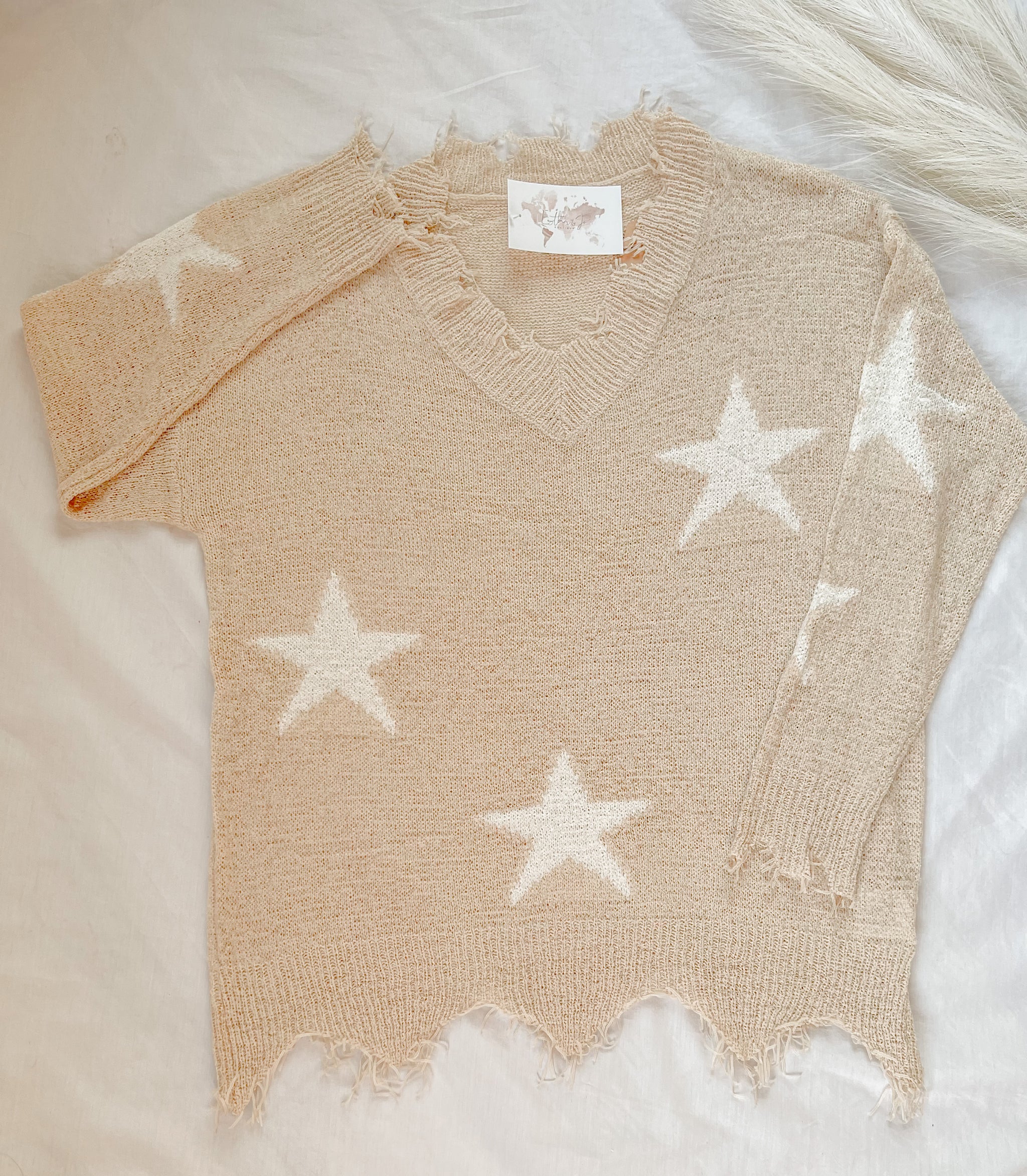 Frayed star sweater hotsell